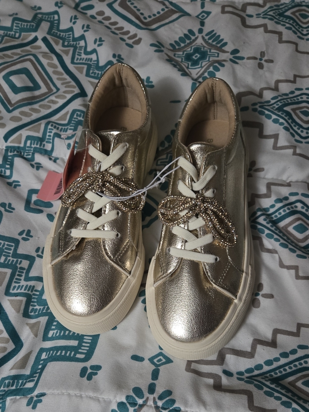 BCBGirls Metallic Gold Crystal Bow Lace-Up Sneakers